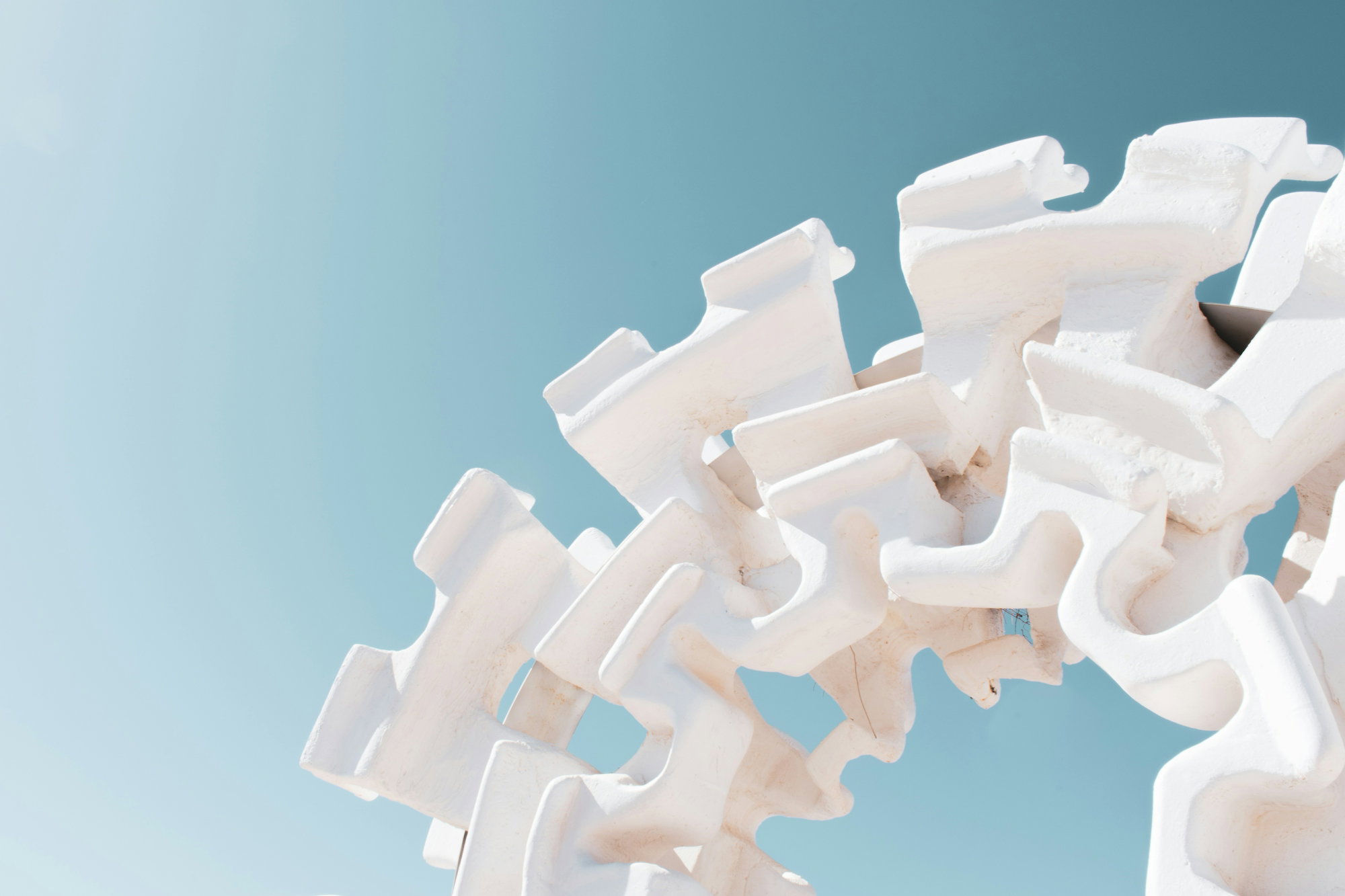 white-puzzle-piece-on-blue-background.jpg white puzzle piece on blue background